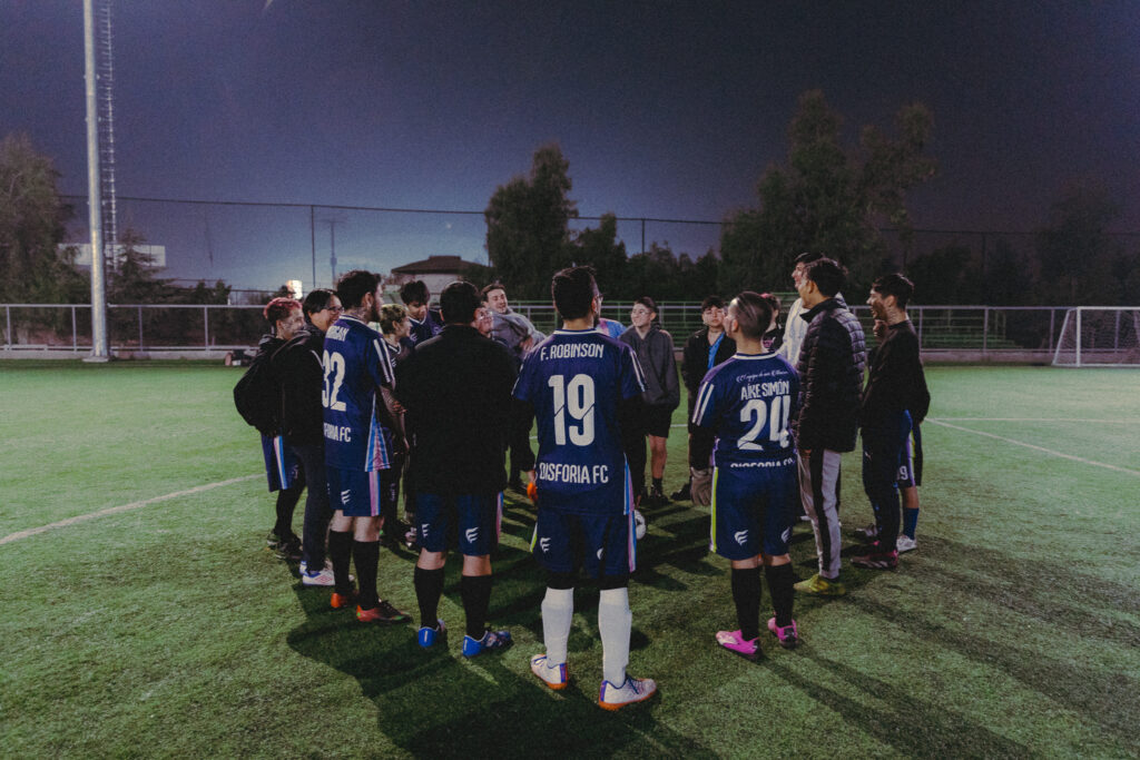 Team in circle showing jerseys with names